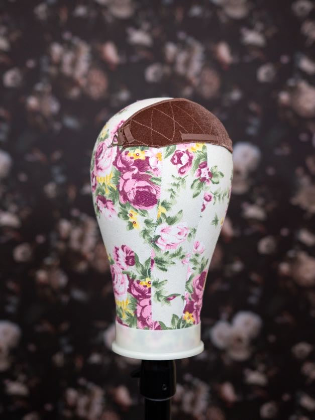 Floral-patterned headband on a dark background